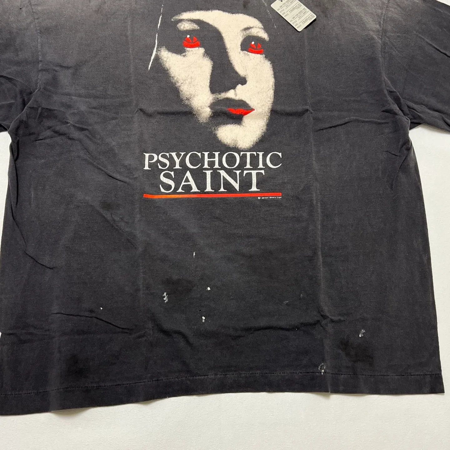 SAINT Mxxxxxx SS TEE/PSYCHOTIC SNT/BLK Gothic heavy metal rock style retro short-sleeved Mysterious woman's face printed distressed TEE Washed black S-XL Same as the original version Cylindrical side seam OE yarn fabric Garment dyeing Faded by heavy washing Bust plaster faded Correct version Matching of original accessories